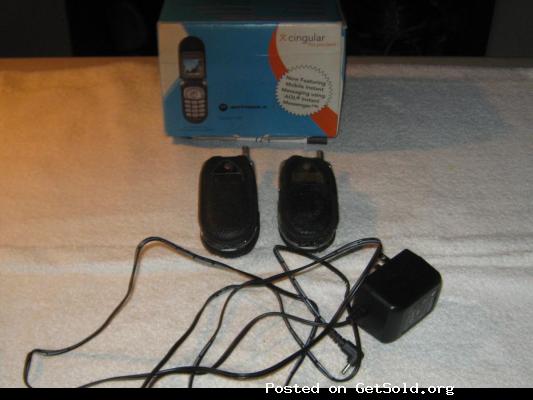 Two Motorola (model V180S) cellphones w/ cases and one charger