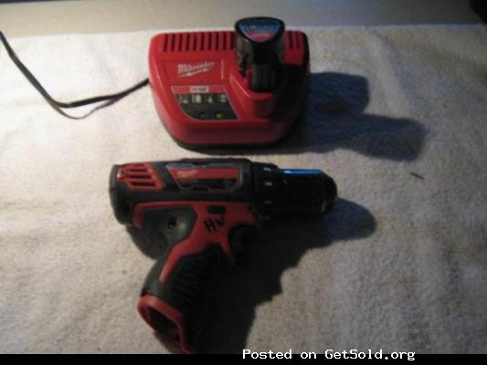 Seldom Used - One each: Milwaukee 3/8 inch Drill Driver #2407-20,  Rechargeable Battery Pack, # 48-11-2401, Battery Charger  #48-59-2401