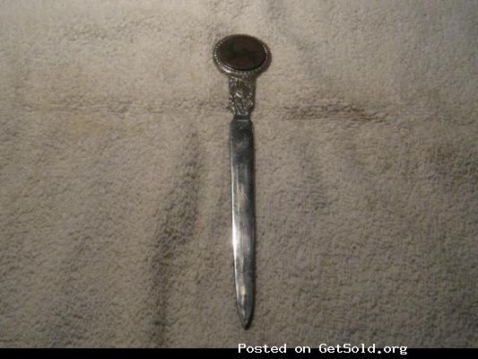 Silver Plated Letter Opener with a coin embedded in the handle