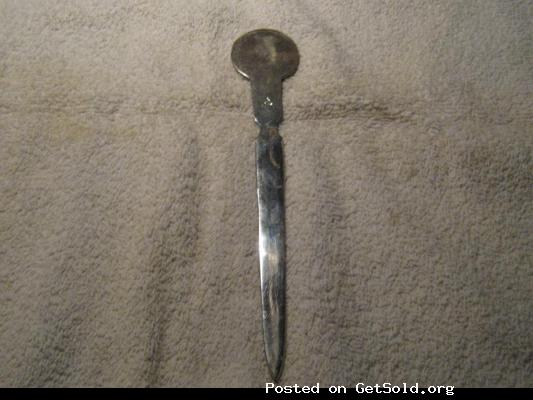 Silver Plated Letter Opener with a coin embedded in the handle