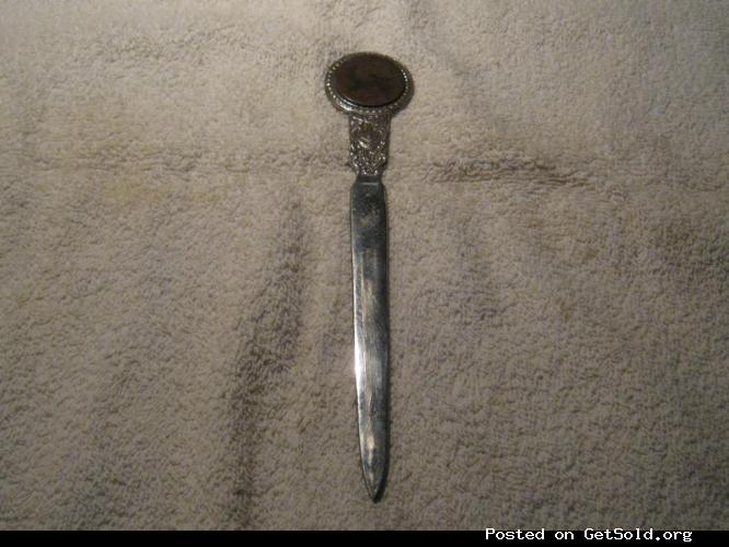 Silver Plated Letter Opener with a coin embedded in the handle