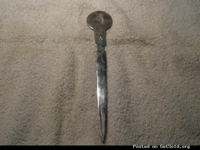 Silver Plated Letter Opener with a coin embedded in the handle