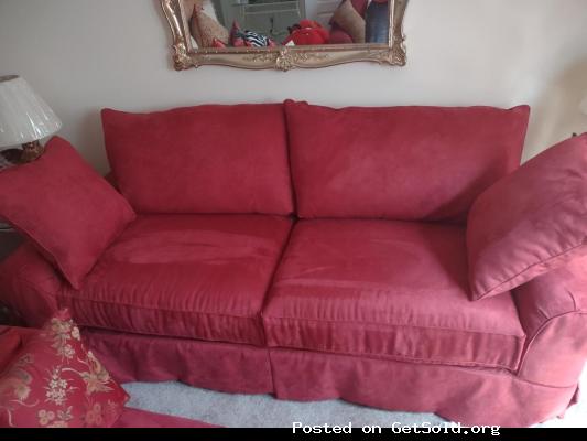 Red Sofa With 4 Cushioned Pillows