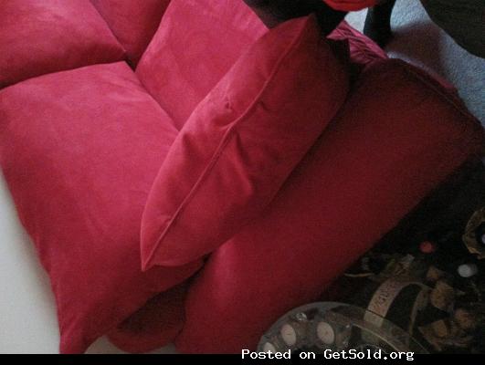 Red Sofa With 4 Cushioned Pillows