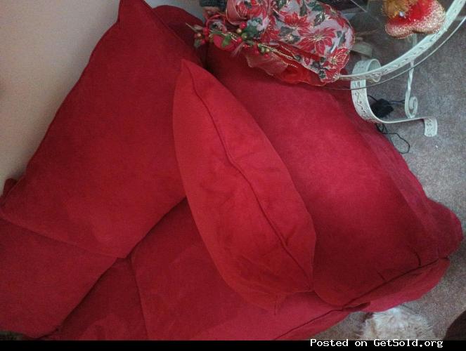 Red Sofa With 4 Cushioned Pillows